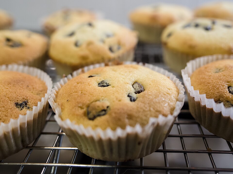 Small cakes cooling on a wire rack