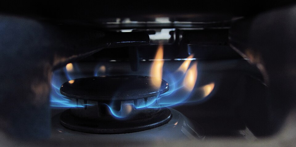 Blue flames on a gas hob burner