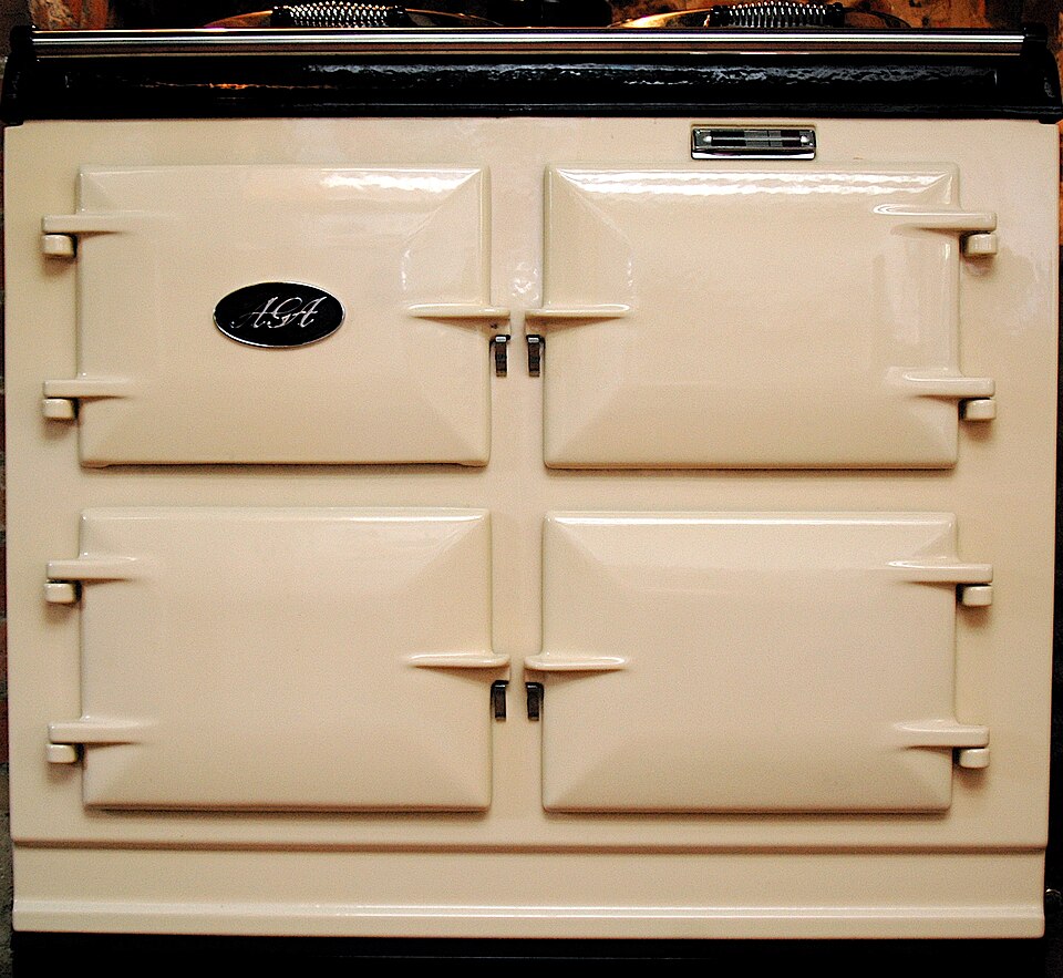 A cream cast-iron heat-storage range cooker