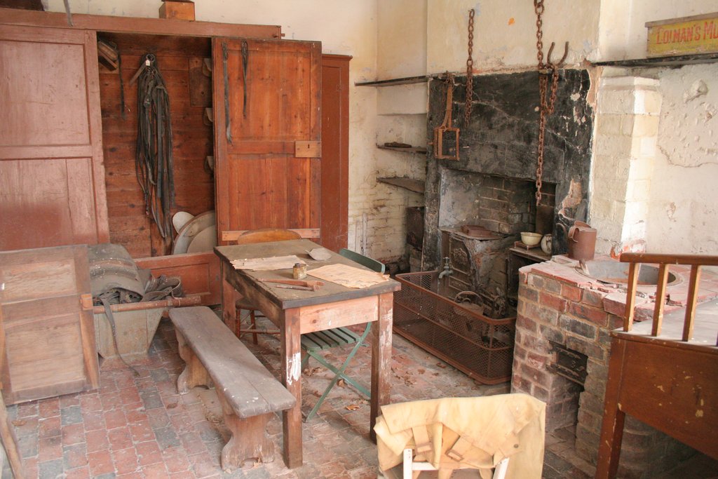 The old scullery at Calke Abbey, with a stone sink and wooden tubs