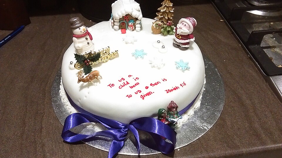 An iced and decorated Christmas cake