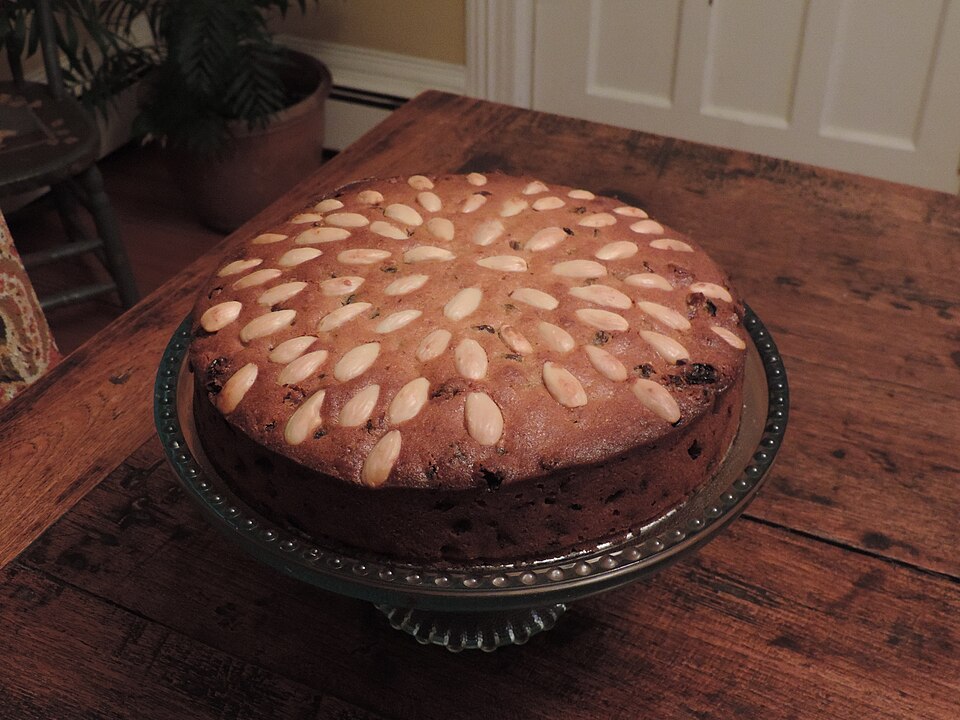 A Dundee cake topped with rings of whole almonds