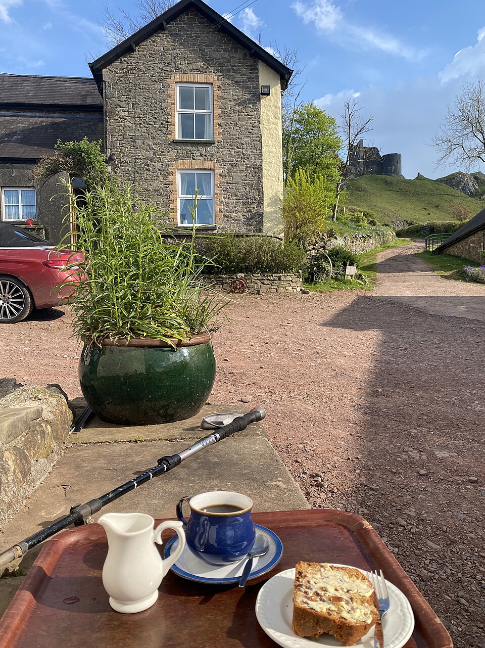 A slice of bara brith served with tea at a Welsh café