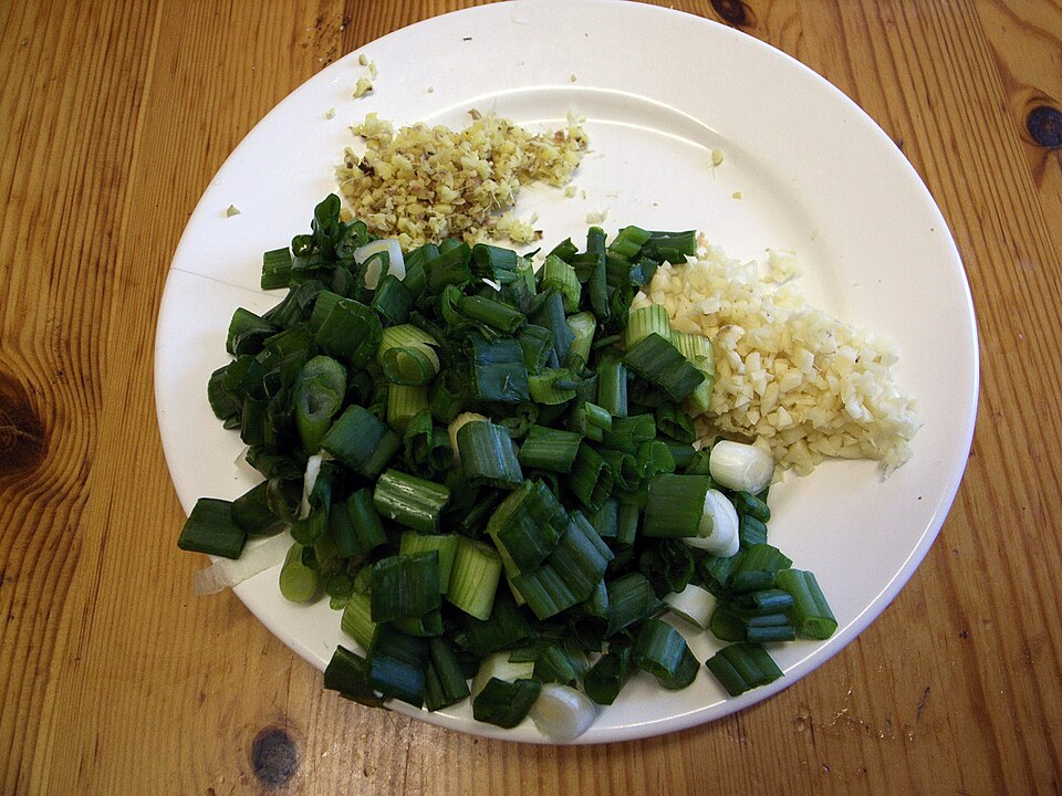 Chopped spring onions on a plate