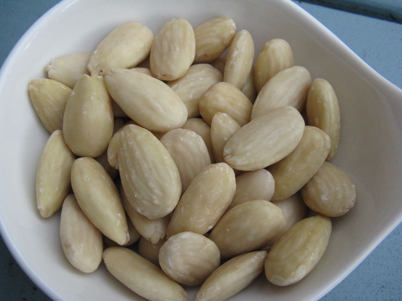 Whole blanched almonds in a bowl