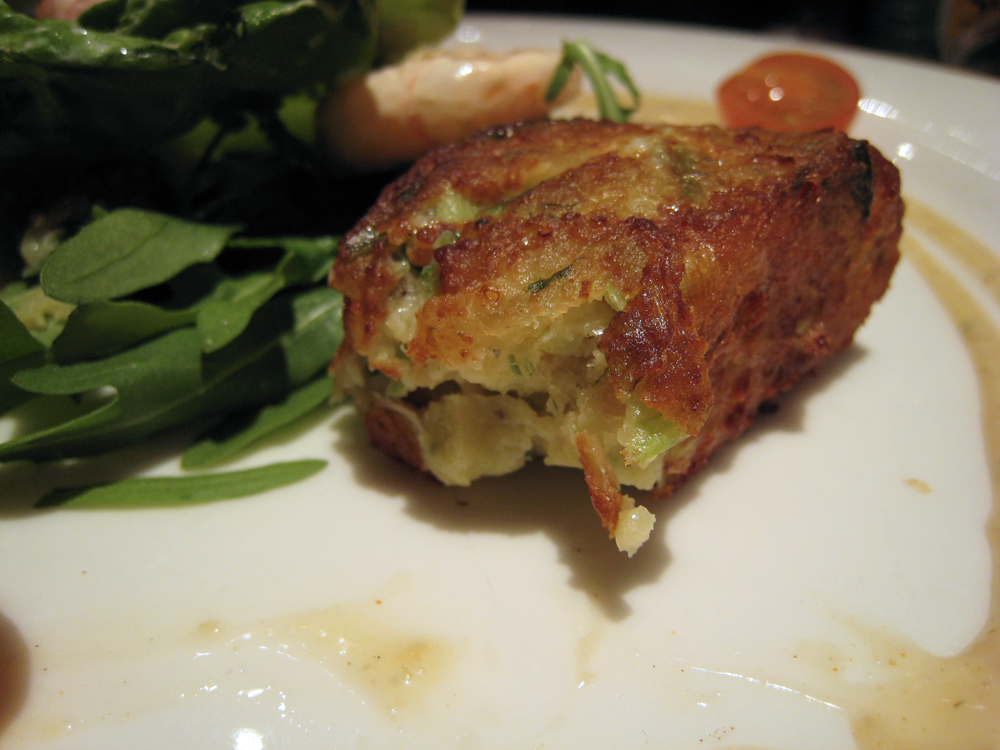A fried Glamorgan sausage, golden and crisp