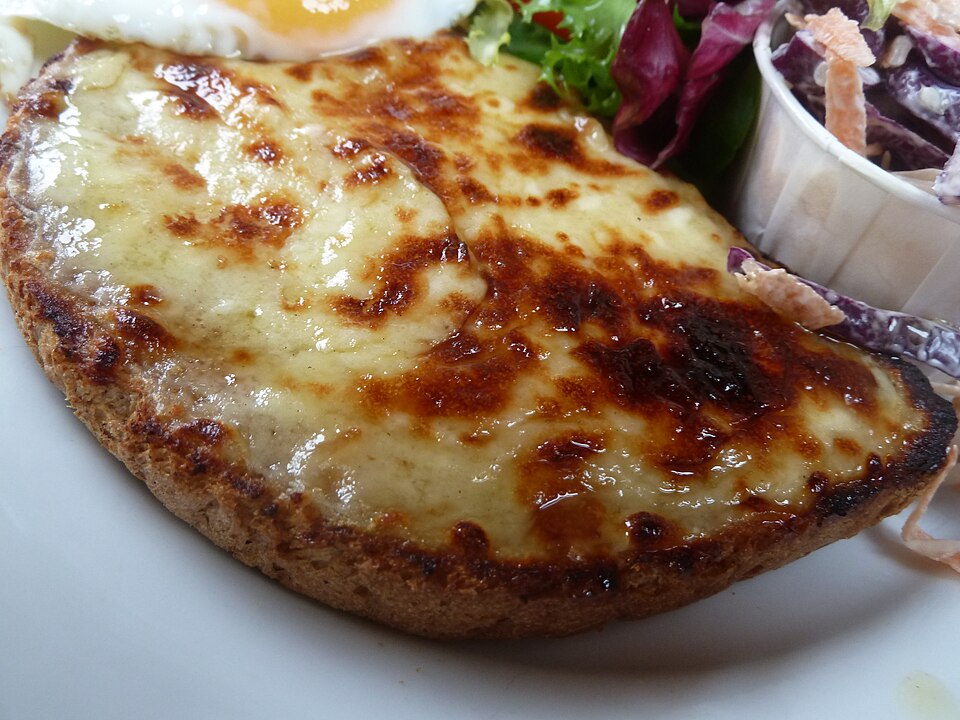 Welsh rarebit grilled until bubbling and browned