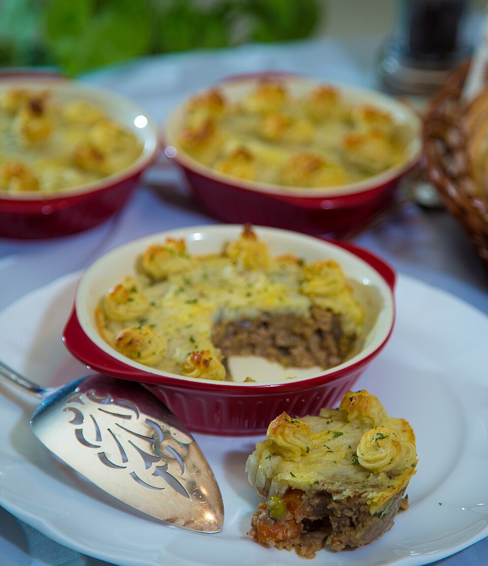 Baked shepherd's pies with browned potato tops
