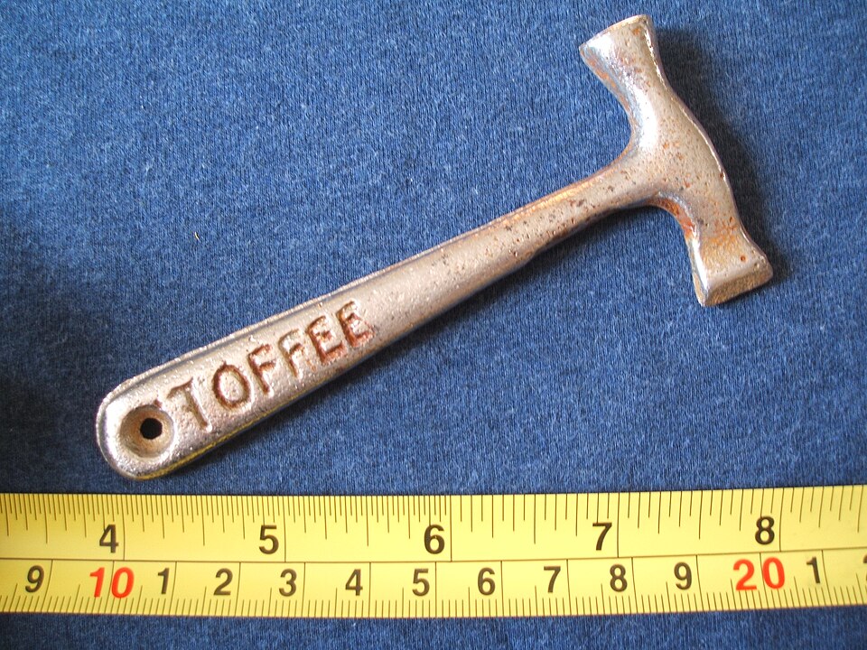 A small metal toffee hammer