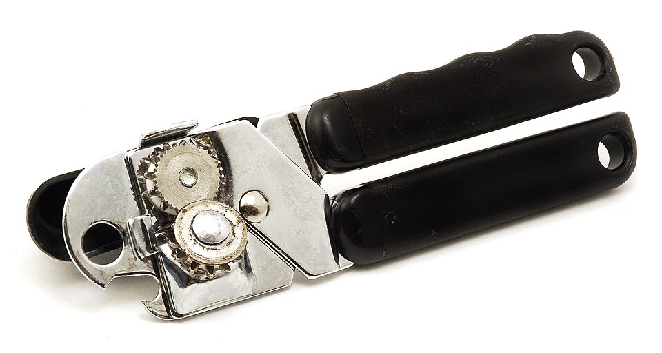 A handheld can opener with black handles