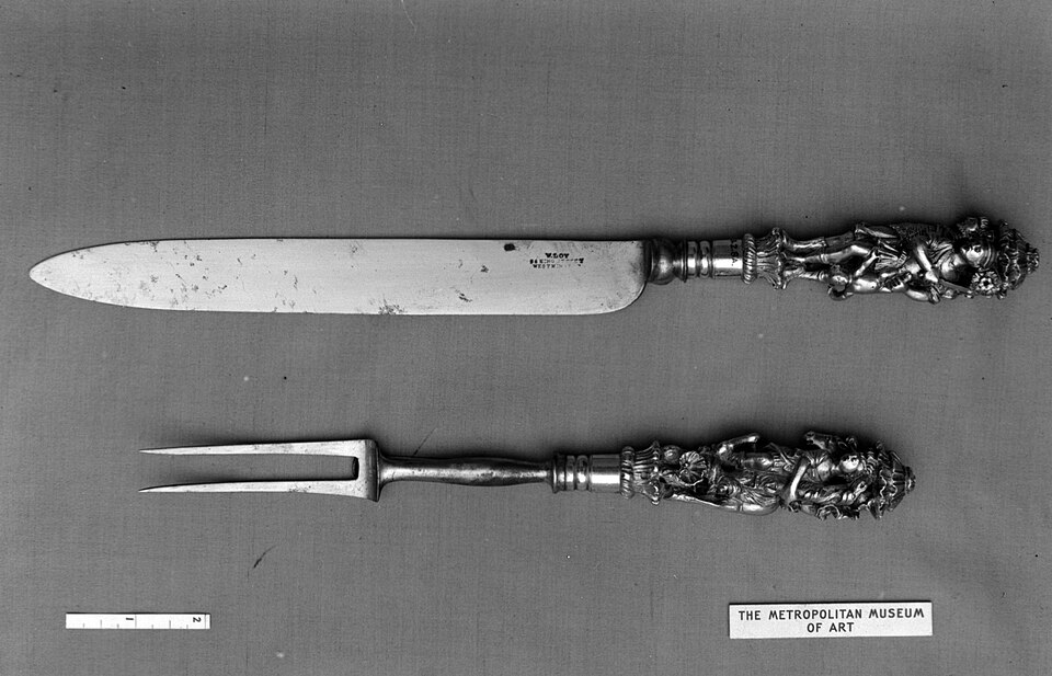 An antique carving knife and fork