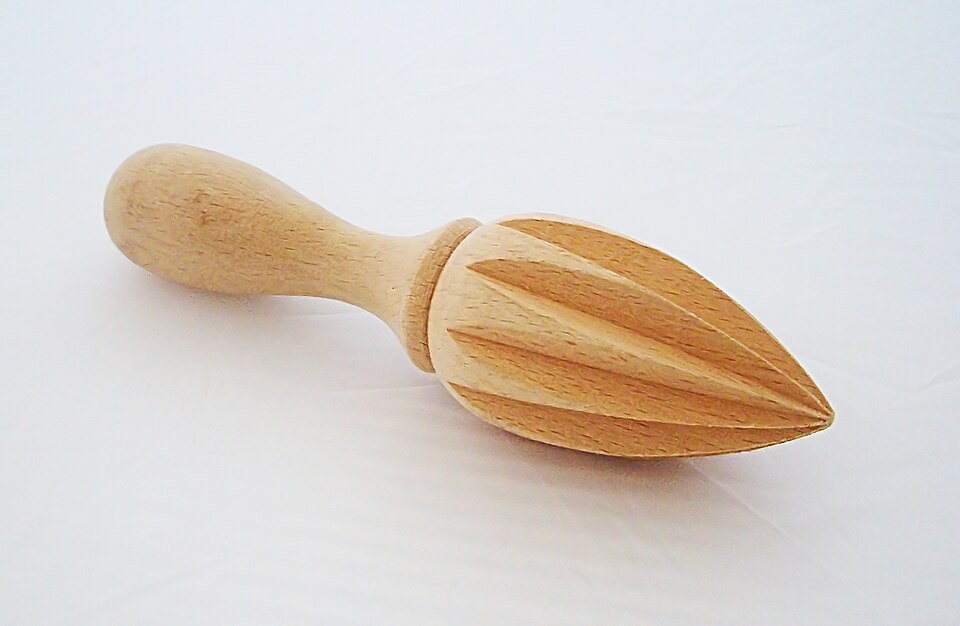 A wooden lemon reamer