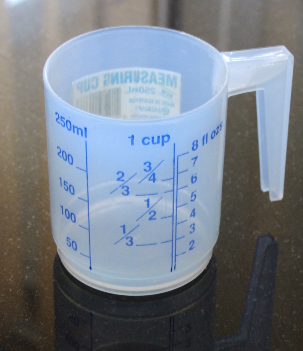 A plastic measuring jug marked in millilitres