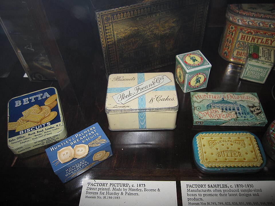 A display of old decorated biscuit tins