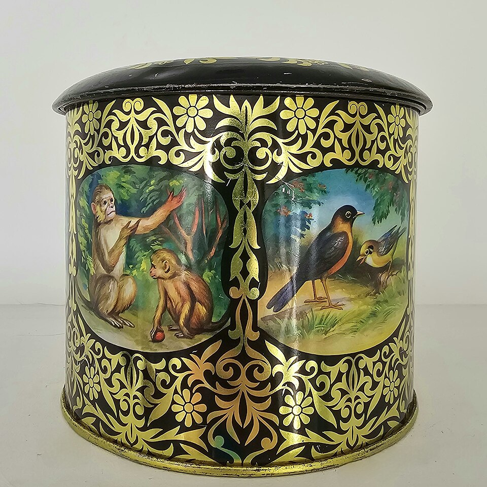 A decorated vintage tea tin