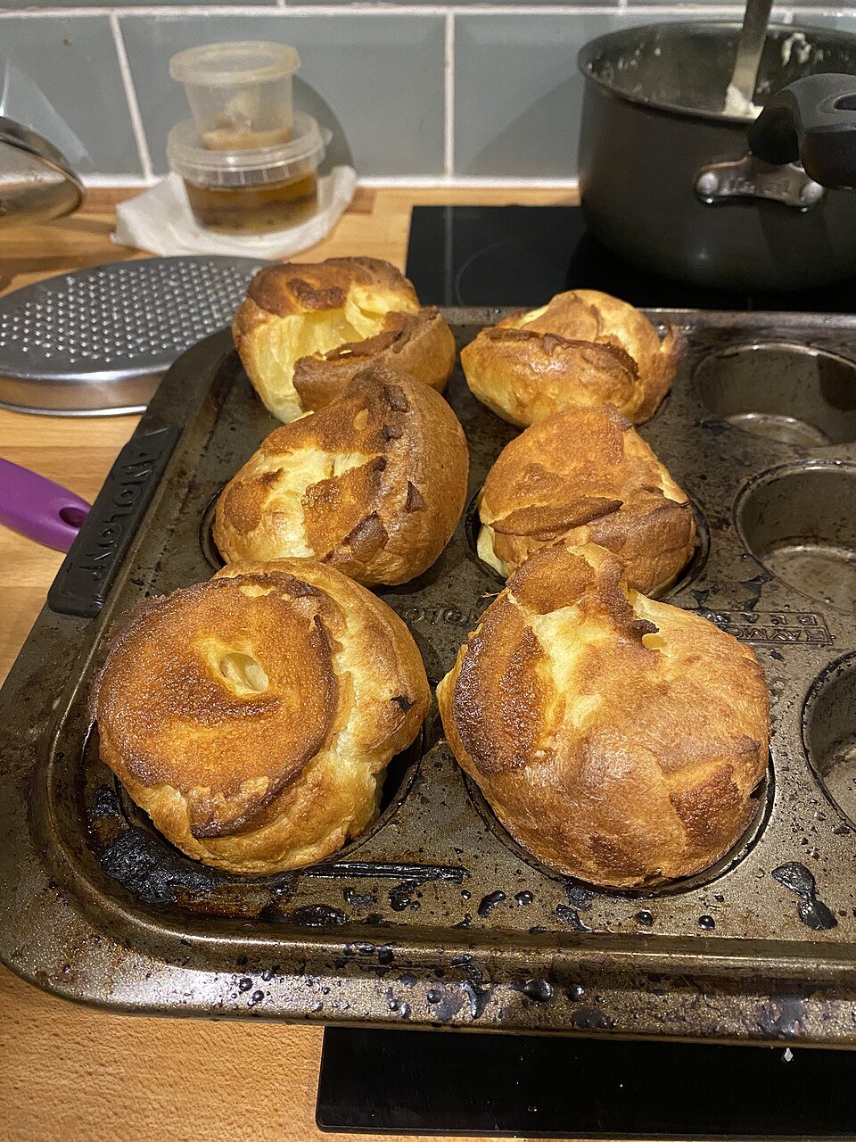 Yorkshire puddings in a baking tin