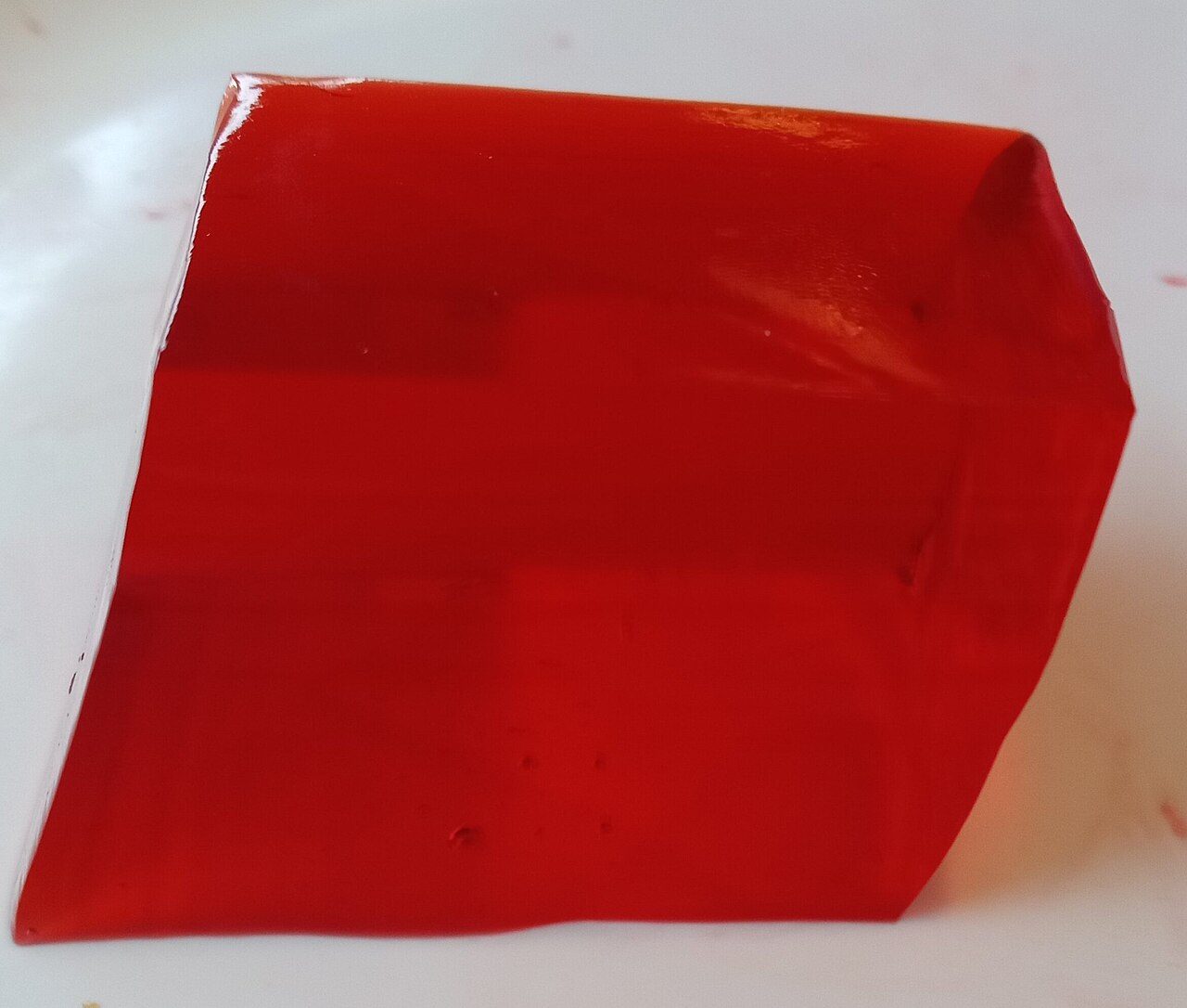 Block of strawberry gelatin