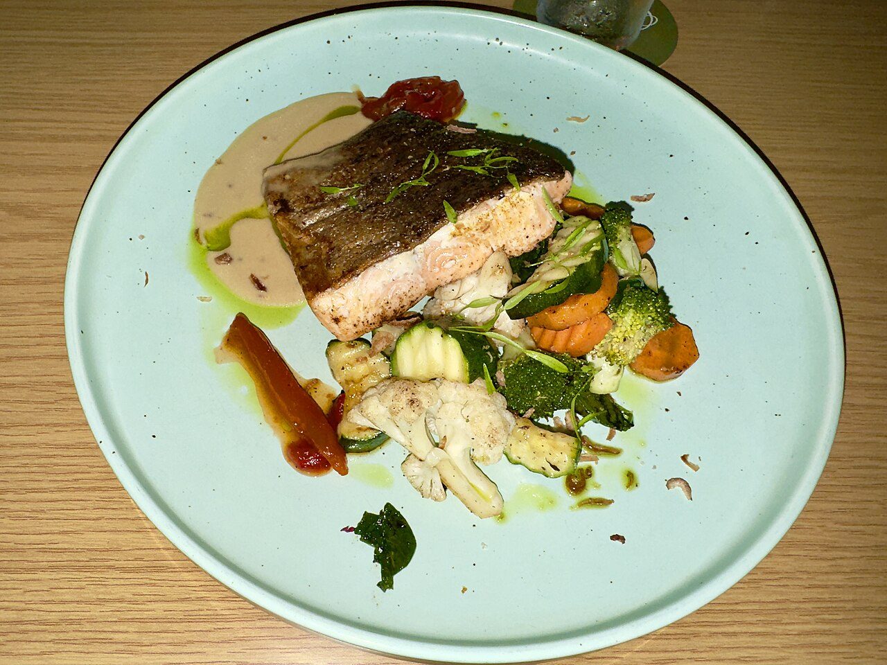 Plate of salmon with vegetables