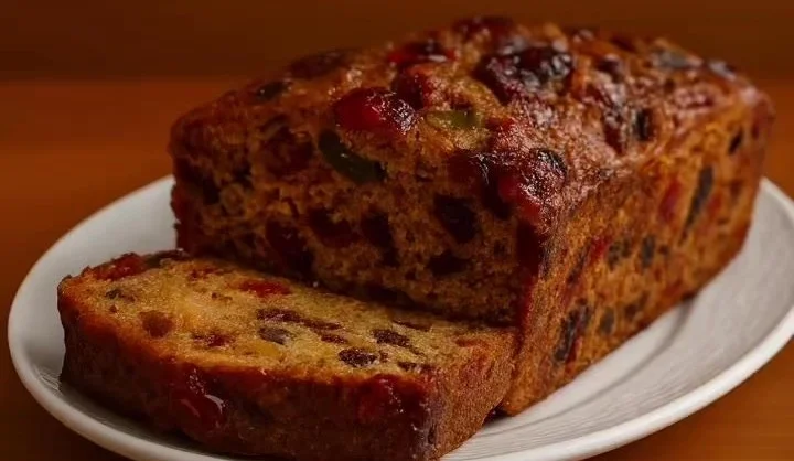 Traditional British Fruitcake Delicious slice of traditional British fruitcake with fruits and nuts